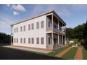 Side view of a two-story home featuring a double porch and ample windows at 63 Montagu St, Charleston, SC 29401