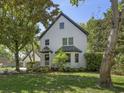 A charming two story home with a lush landscaped front yard at 699 Castle Pinckney Dr, James Island, SC 29412