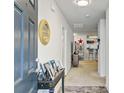 Inviting entryway with neutral walls and easy access to the kitchen and bath at 121 Keaton Brook Dr, Summerville, SC 29485