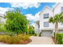 Inviting exterior view of home showcasing a well-manicured yard and tasteful landscaping at 2578 Helmsman Rd, Johns Island, SC 29455