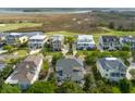 Desirable coastal community with lush green golf course and marsh views in the background at 2645 Crooked Stick Ln, Mount Pleasant, SC 29466