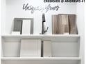 Design center featuring cabinet samples, flooring options, faucet fixtures and countertop swatches at 403 Cadbury Loop, Summerville, SC 29486