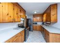 Traditional kitchen with wooden cabinets, stainless steel appliances, and neutral countertops at 4515 Holmes Ave, North Charleston, SC 29405