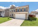 Well-maintained home with a two-car garage, tidy landscaping, and a concrete driveway at 1311 Berry Grove Dr, Summerville, SC 29485