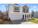 Two-story home with two car garage and traditional exterior siding with craftsman accents at 1816 Casein St, Summerville, SC 29483