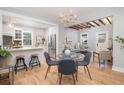 Open living area features a light and bright kitchen, dining area, and living room space at 301 Beaufort St, Summerville, SC 29483