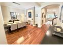 Formal dining room featuring hardwood floors, neutral paint, with large table for hosting dinner parties at 1736 James Basford Pl, Mount Pleasant, SC 29466