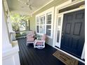 Relaxing front porch with comfortable seating and a welcoming entrance to the home at 1736 James Basford Pl, Mount Pleasant, SC 29466