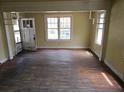 Inviting living room featuring hardwood floors and abundant light at 2313 Aintree Ave, North Charleston, SC 29405