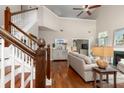 Beautiful living room featuring hardwood floors, high ceilings, and natural light at 2632 Planters Pointe Blvd, Mount Pleasant, SC 29466