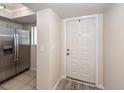 Functional entryway featuring access to the kitchen and stainless steel refrigerator at 2901 Dove Haven Ct # C, Charleston, SC 29414