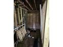 A bare room with exposed studs, unfinished floors, and visible plumbing, offering a blank canvas for customization at 436 W Butternut Rd, Summerville, SC 29483