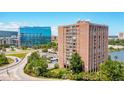 Exterior view of building complex with adjacent modern office building at 14 Lockwood Dr # 6I, Charleston, SC 29401