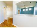 Bright entryway and dining room area with hardwood floors and plenty of natural light at 309 Peters Creek Dr, Summerville, SC 29486