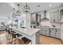 Modern kitchen features a large island, sleek countertops, and stainless steel appliances at 4414 Avery Ave, North Charleston, SC 29405