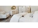 Cozy bedroom with stylish furnishings, plush bedding, and serene decor at 1021 Sagegrass Street, Summerville, SC 29485