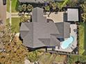 Aerial view of the home showcasing the backyard pool, patio, and well-maintained landscaping at 127 Beresford Creek St, Daniel Island, SC 29492