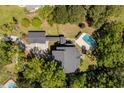 Expansive property with a private pool, lush greenery, and an attached garage at 1505 Rivertowne Country Club Dr, Mount Pleasant, SC 29466