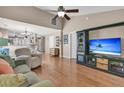 Cozy living room featuring vaulted ceiling, hardwood flooring, and comfortable seating at 157 Townsend Way, Summerville, SC 29483