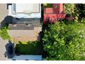An aerial view of several houses, featuring their rooftops and surrounding greenery at 20 Felix St, Charleston, SC 29403