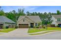 Well maintained single story home with mature landscaping on a tree lined street at 219 Whirlaway Dr, Moncks Corner, SC 29461