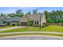 Well maintained single story home on a corner lot with mature landscaping at 219 Whirlaway Dr, Moncks Corner, SC 29461