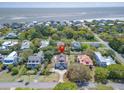 Beautiful home in a lovely coastal community, surrounded by mature trees and close to the ocean at 3013 Middle St, Sullivans Island, SC 29482