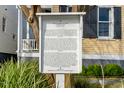 Historical marker detailing the rich history and architectural significance of the home at 49 Ashley Ave, Charleston, SC 29401