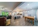 Open-concept living area with modern flooring, a kitchen island, and plenty of natural light at 779 Dills Bluff Rd, Charleston, SC 29412