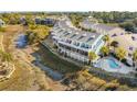 Beautiful townhouse exterior with balconies and a swimming pool at 81 Sandbar Ln # 19, Folly Beach, SC 29439