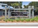 Horizons at Summers Corner community sign with mature landscaping and welcoming entrance at 1013 Sagegrass St, Summerville, SC 29485