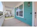 Inviting front porch with views of the neighborhood and space for seating at 1238 Homecoming Blvd Blvd, Ravenel, SC 29470