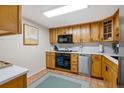 A well-equipped kitchen with stainless steel appliances and bright cabinets at 14 Lockwood Dr # 1C, Charleston, SC 29401
