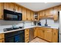 Well-lit kitchen with updated cabinets and modern appliances at 14 Lockwood Dr # 1C, Charleston, SC 29401