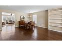 Spacious dining room with hardwood floors, a wooden table, and natural light at 167 Decatur Dr, Summerville, SC 29486