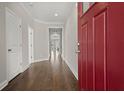 Inviting entryway with hardwood floors and a view straight into the living area at 267 Palmetto Walk Dr, Summerville, SC 29486