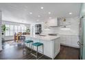 Well-lit kitchen featuring an island and modern appliances, perfect for culinary enthusiasts at 413 Station 22 1/2 St, Sullivans Island, SC 29482