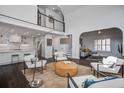 Open-concept living space with lots of light and modern decor, connecting the kitchen and living areas at 413 Station 22 1/2 St, Sullivans Island, SC 29482