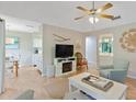 Cozy living space features modern tv set, ceiling fan, and ample natural light at 4856 Green Dolphin Way # Share 7, Kiawah Island, SC 29455