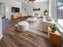 Bright and airy living room featuring modern furniture, stylish decor, and beautiful hardwood floors at 529 Delafield Dr # 529, Summerville, SC 29483