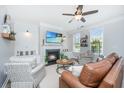 Inviting living room with a fireplace, ceiling fan, and comfortable seating at 754 Certificate Ct, Charleston, SC 29414