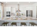 Bright, modern kitchen with a large island, stainless steel appliances, and ample counter space at 782 Clay Field Trl, Summerville, SC 29485