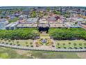 An aerial view showcasing a beautifully landscaped park, fountain, and nearby architecture in Charleston, SC at 1 Vendue Range # I, Charleston, SC 29401