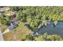 Aerial view of a house with a private dock in the backyard at 107 Jacks Ln, Bonneau, SC 29431