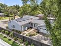 Spacious backyard featuring a fenced yard, patio, and a detached two-car garage at 1406 Glencoe Dr, Mount Pleasant, SC 29464