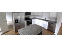 Updated kitchen with granite counters, subway tile backsplash, and stainless steel appliances at 148 Lancashire Rd, Summerville, SC 29486