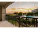 Enjoy spectacular views of the community pool from the private balcony at 222 S Plaza Ct, Mount Pleasant, SC 29464