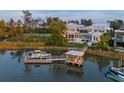 Expansive waterfront estate featuring private boat dock, gazebo, and luxurious home with backyard swimming pool at 332 Bayley Rd, Daniel Island, SC 29492