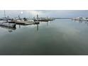 View of the open water as seen from the boat slips with multiple boats berthed next to them at 67 W 10Th St # D-26, Folly Beach, SC 29439