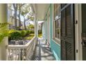 Inviting porch with views of the backyard, showcasing the outdoor living space at 11 Franklin St, Charleston, SC 29401